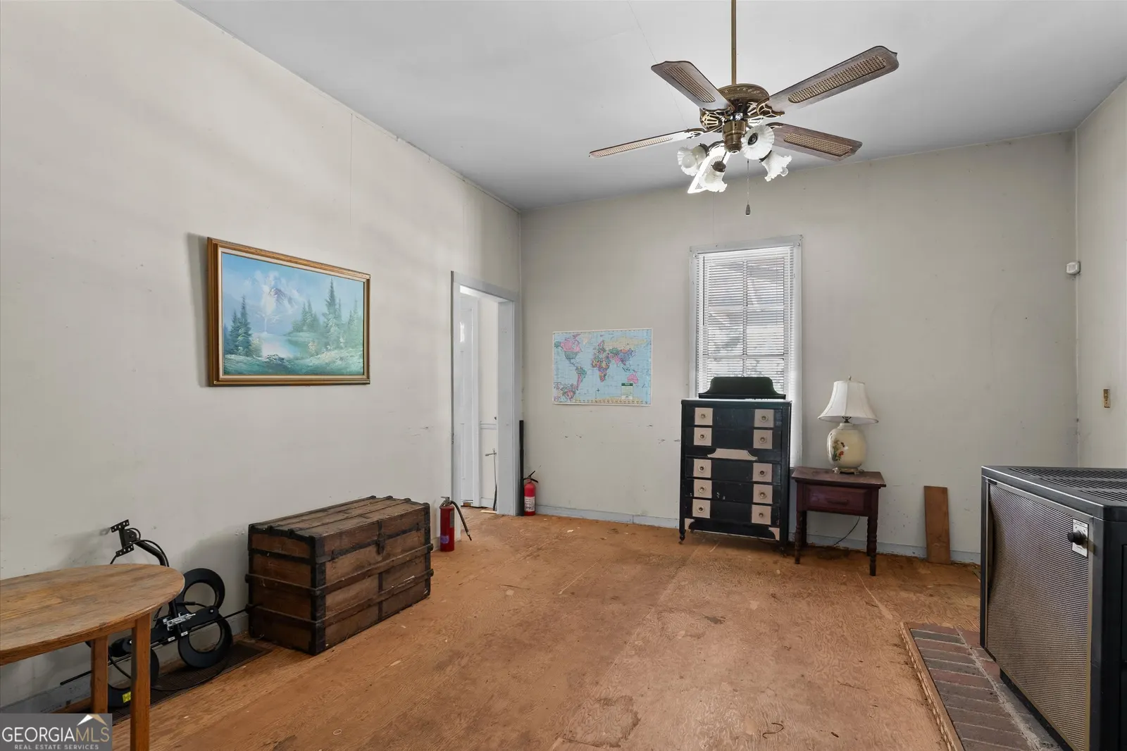 Bonus room with carpet, a ceiling fan and a door leading outside