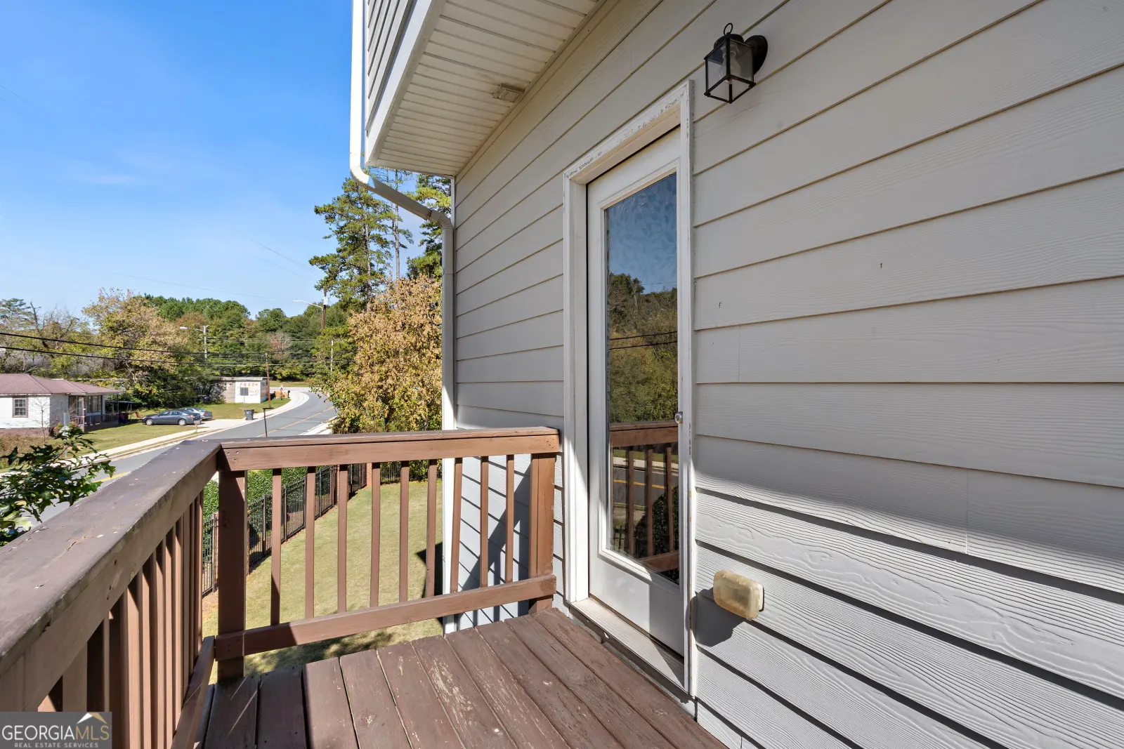 Back deck off the kitchen, with a view down the street