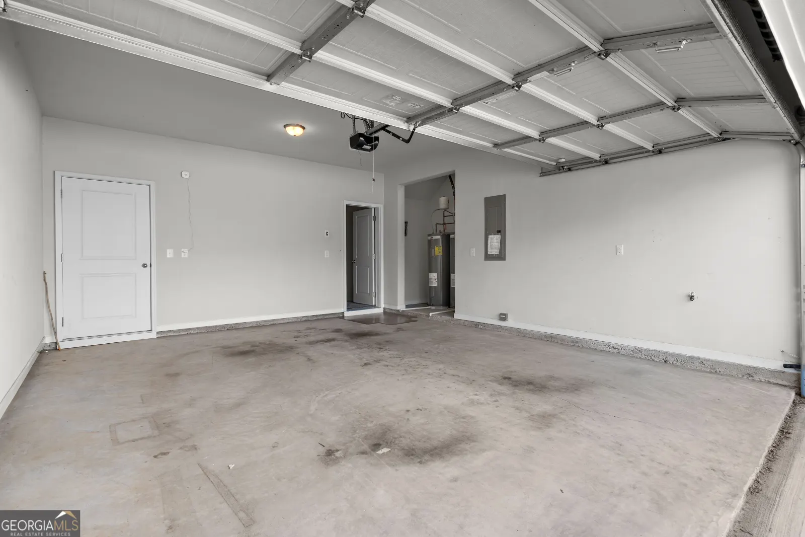 Two-car garage with a door into the house