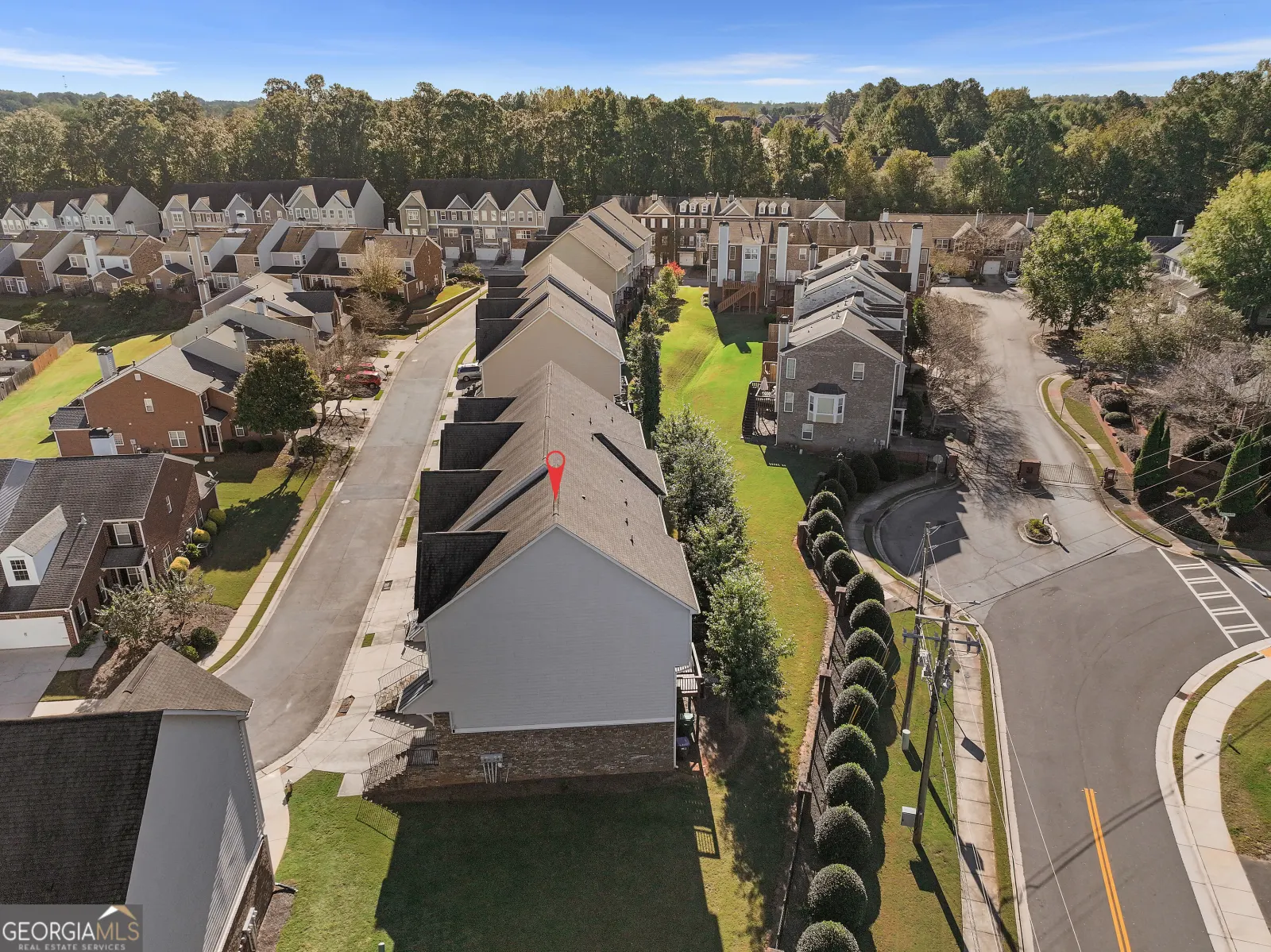 Aerial view of the Chatham Village townhouses, with the end unit marked